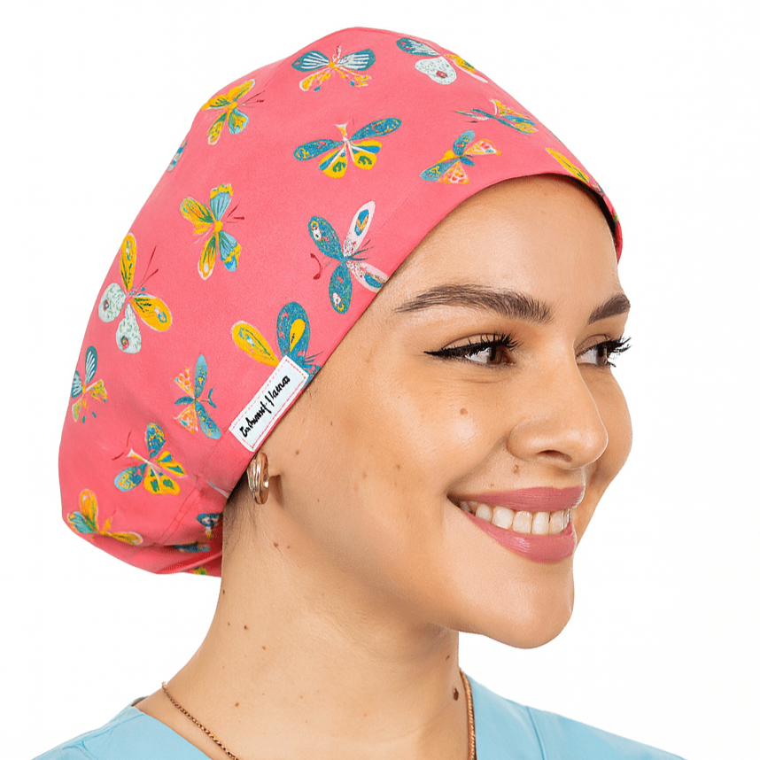 coral scrub cap with butterflies
