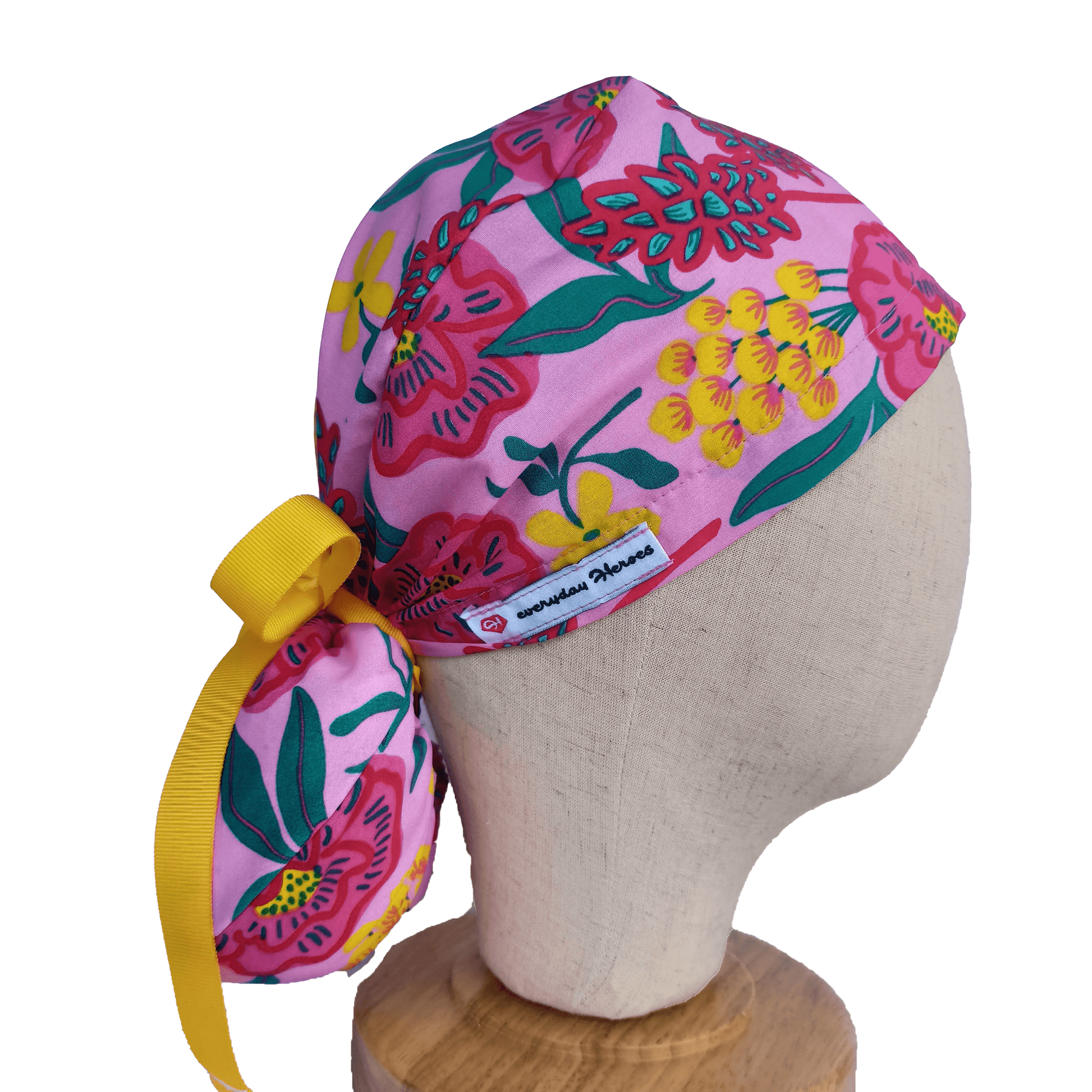 Pink scrub cap with flowers andyellow ribbon 