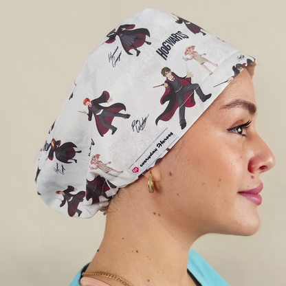 Magical, wizard-inspired scrub caps for women with an enchanted school of magic and spells theme fabric