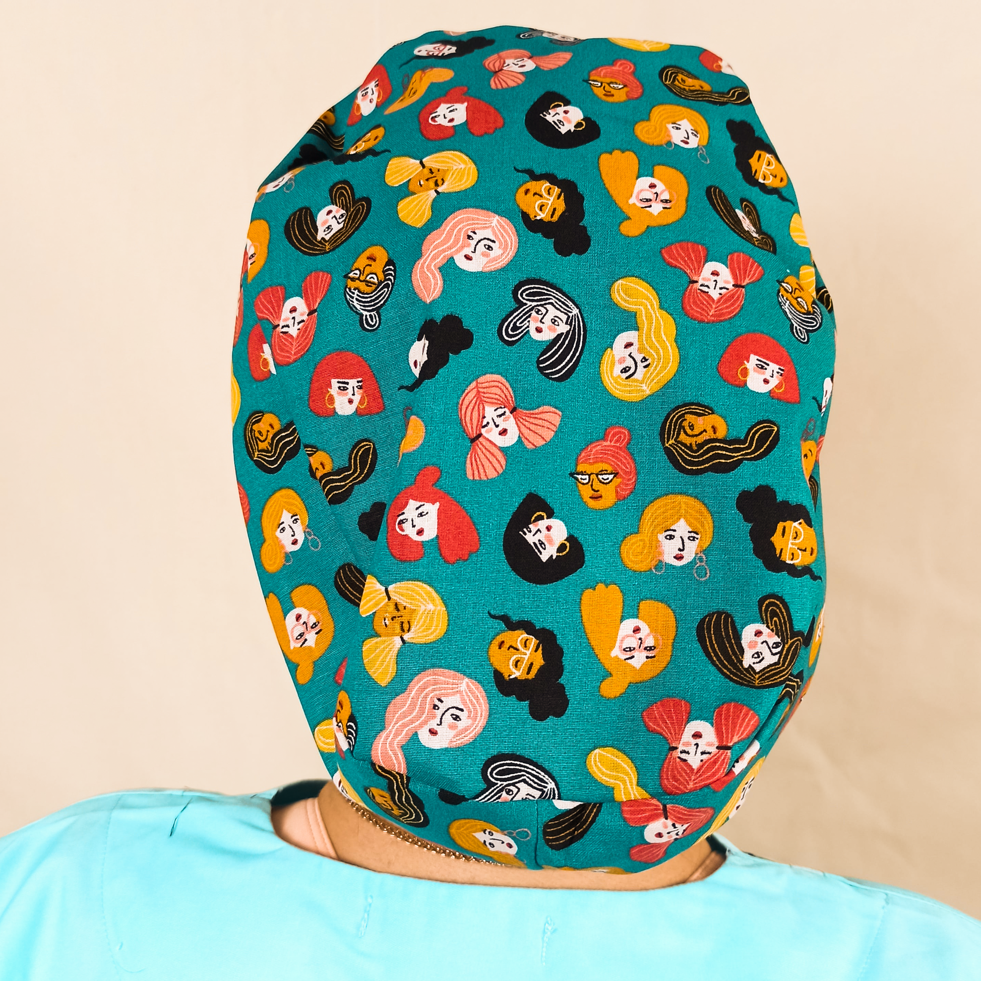 Hat for gynecologist with womans faces ,its a scrub cap with satin if you want add the name of the doctor