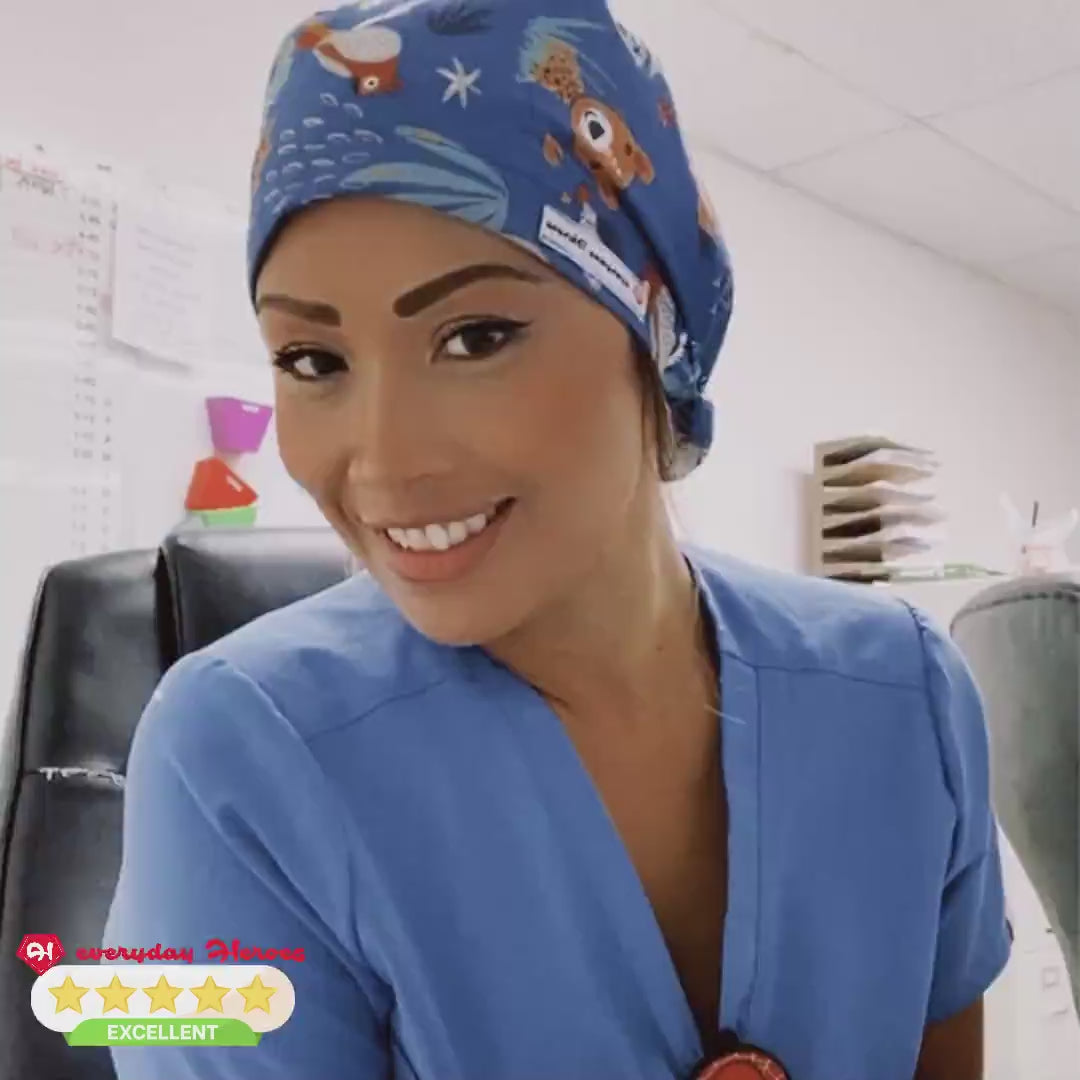 Load video: customer reviews with photos showing the smiles on their face waering the fun scrub caps from everyday heroes store