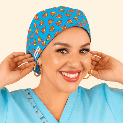 a super heroe nurse wearing a scrub hat euro style blue with the red logo smiling 