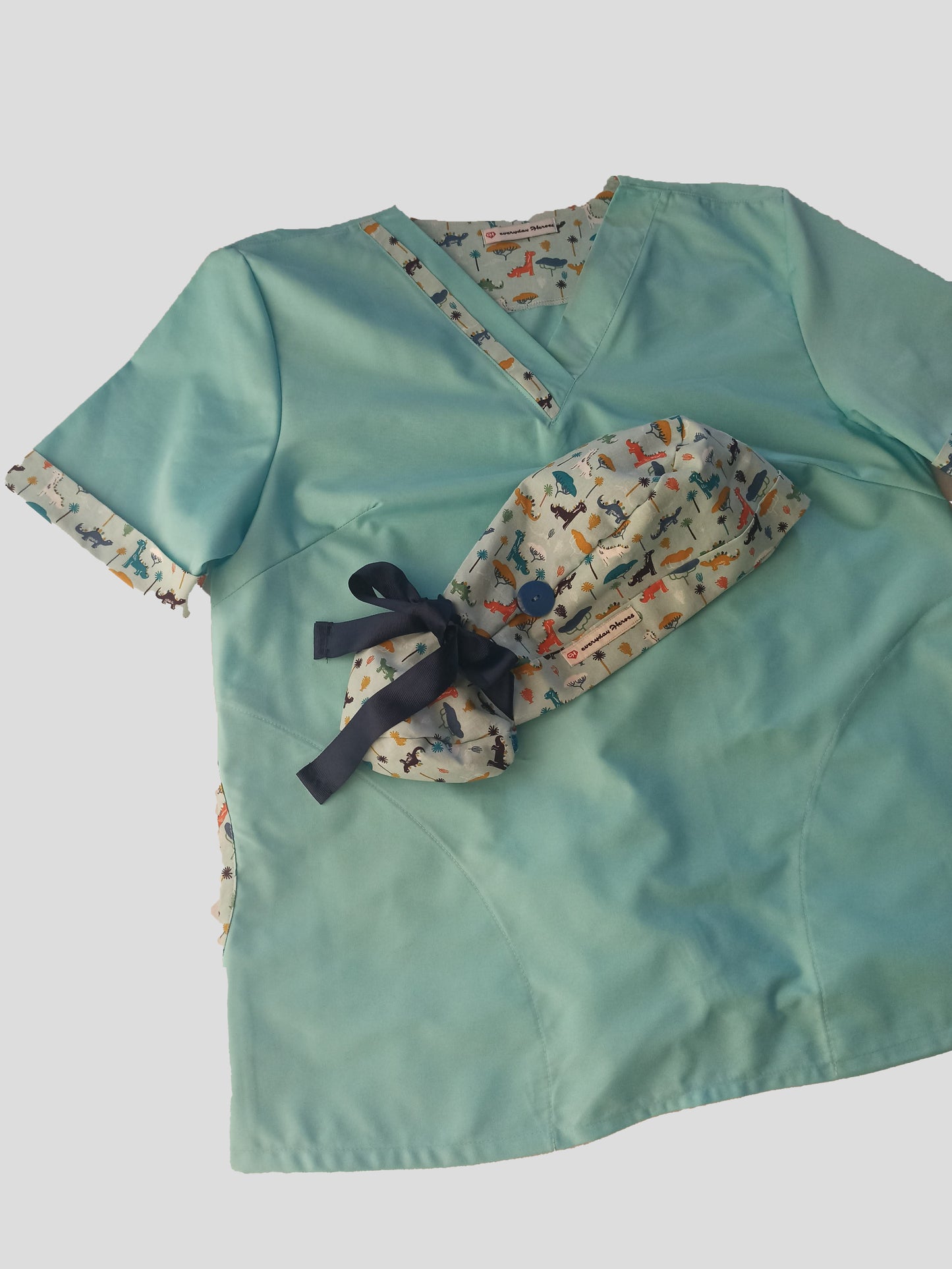 Scrub Top for Nurses with Dinos print details - [scrub_hat]-[scrub_cap_for_women]-[surgical_cap]